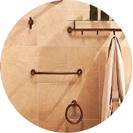round image of bathroom fixtures and organized towel racks hooks and rings