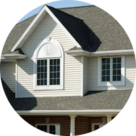 round image of roof of home with window