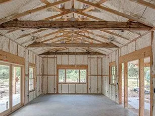 new construction house studs with insulation installed